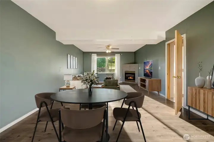 A cozy gas fireplace adds warmth and ambiance, making this space inviting year-round.