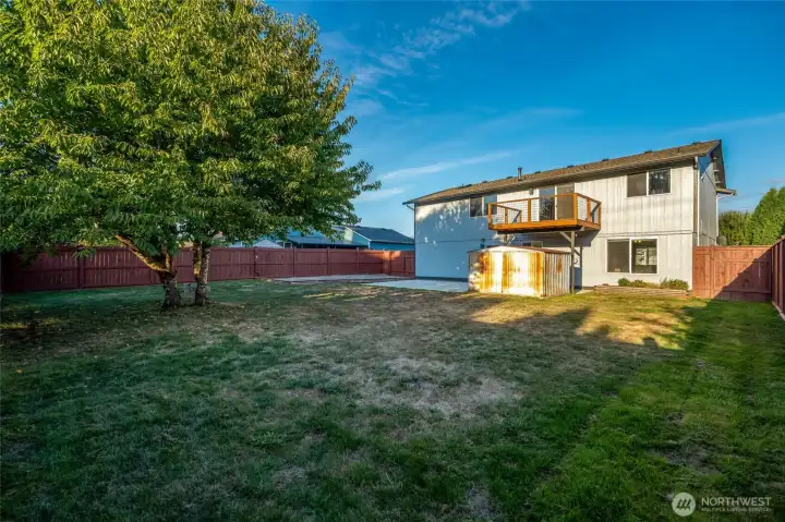 Mature landscaping frames the property, giving a sense of privacy and tranquility.