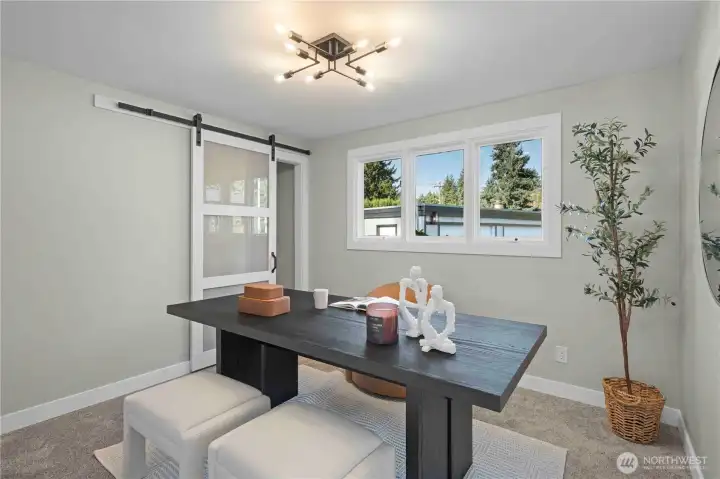 Bedroom/Office Upstairs with custom Barndoors for the closet.