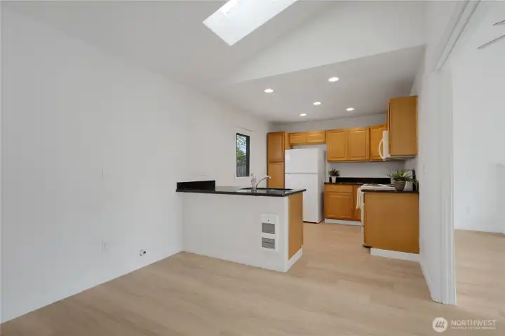 Room for a dining/kitchen table &   bar stools
