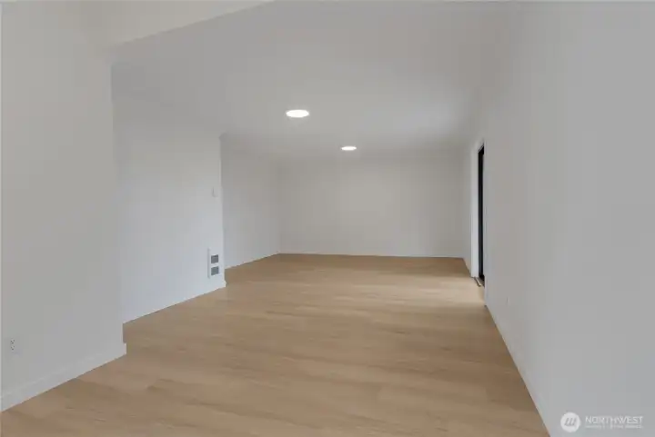 From kitchen you have eating/dining space and family room. New flooring & paint