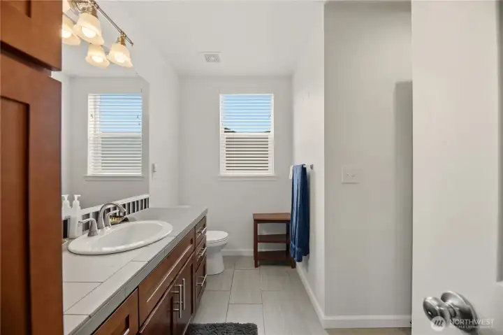 Tile floor and countertops are builder upgrades.