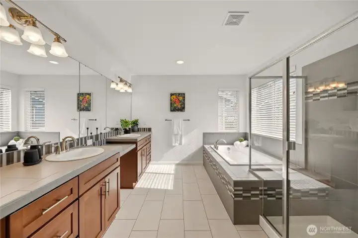 Dual vanities with picturesque makeup station in the center. Huge walk-in closet and bonus linen closet in the bathroom!