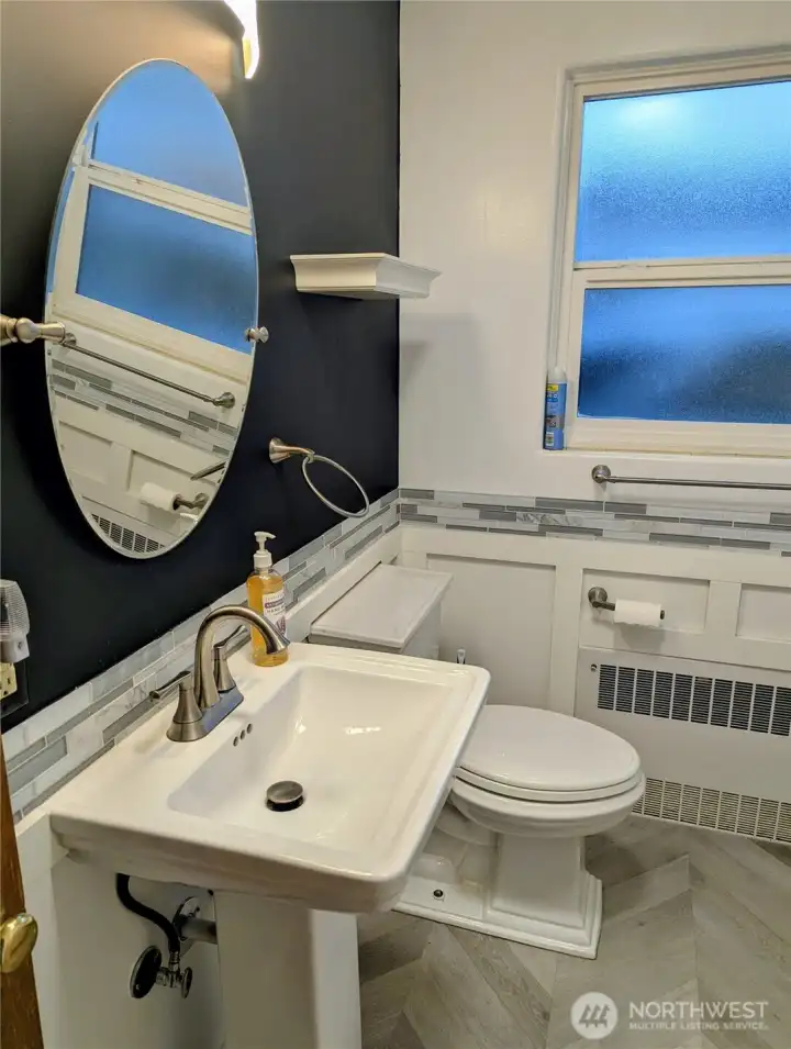 Nes sink, new mirror, new title, freshly painted...