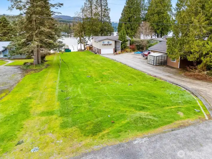 Beautiful grass area to relax by the lake.