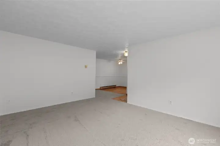 This home has incredible bones and is turn-key for living in now! Small Eating Nook pictured in the background is off the Kitchen.