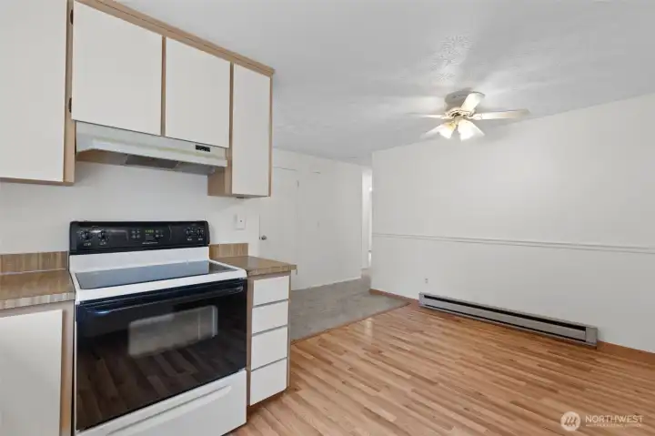 Electric glass-top Oven/Range.  Gas is available in this neighborhood so you can always tap that gas and convert your heating and cooking!