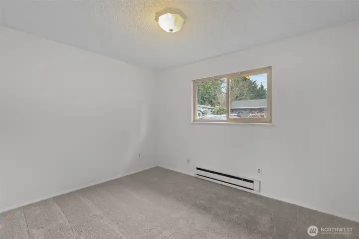 BR #3 is right across the hallway from a FULL BATH and gets southern light exposure through the windows!