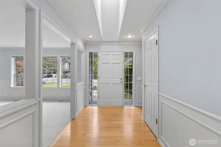 Gracious and light-filled entry into this Possession Bay Rambler.