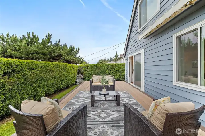 West-facing Oversized deck off formal dining/living room, great for entertaining and soaking in the sun!