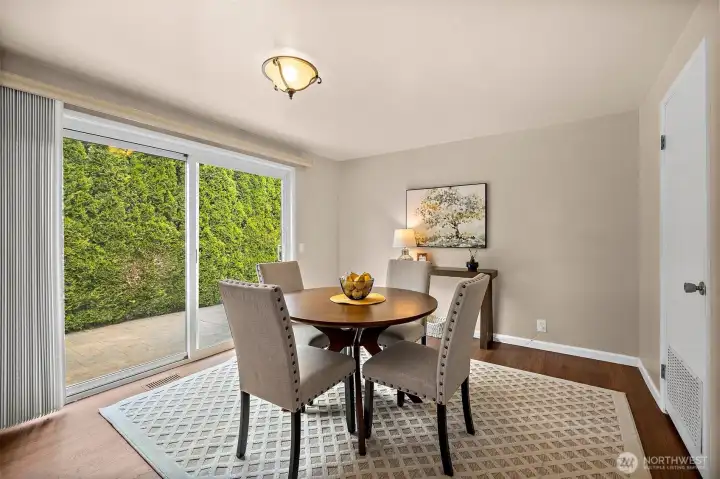 Breakfast nook with slider to large patio