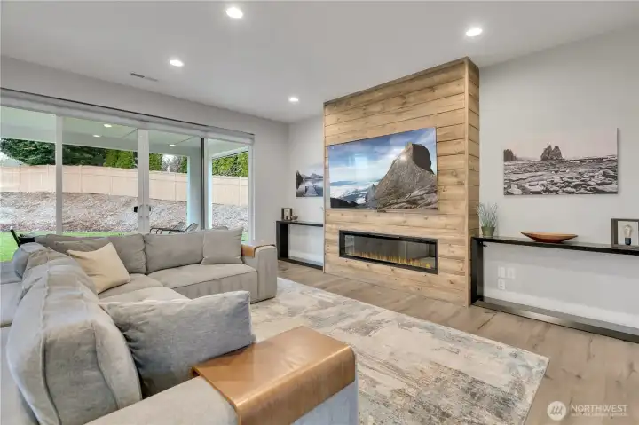 All new fireplace and custom shiplap surround.