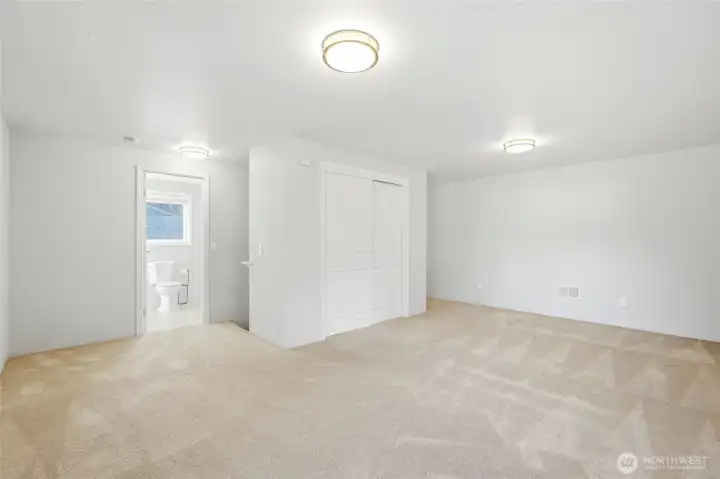Upper level suite with 3/4 bathroom across the room