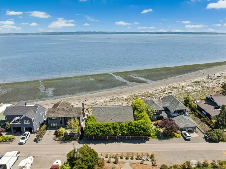 aerial of home with low tide