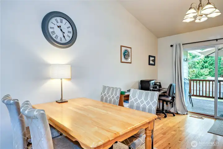 Dining room with slider leading out to the back deck