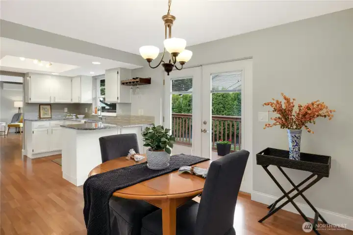 Enjoy meals with the French doors open to your private deck