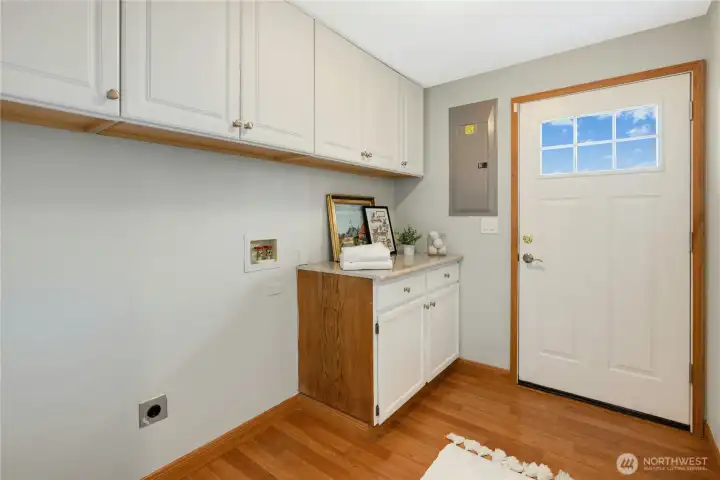Laundry/Utility room with door to back yard