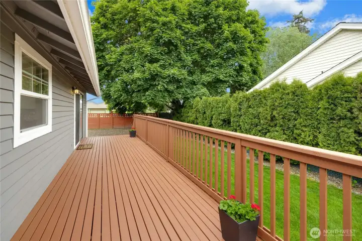 Big deck with French doors from the dining area and slider dingo family room….a great set-up for hosting summer BBQs