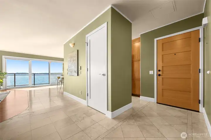 Entry area looking west. Outside deck and view.