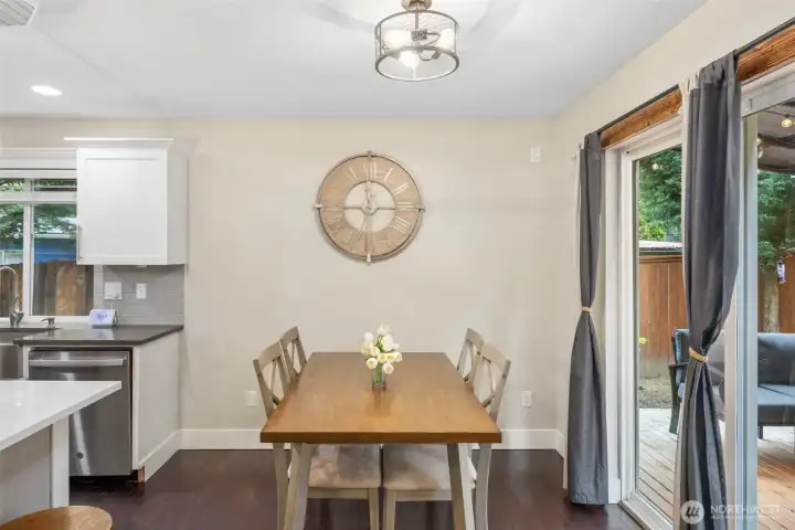 Dining room off of kitchen with a sliding door that leads to the new outside porch.