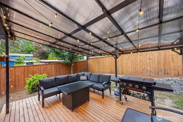 Newly built covered outdoor porch, ideal for year-round indoor/outdoor living and entertaining.