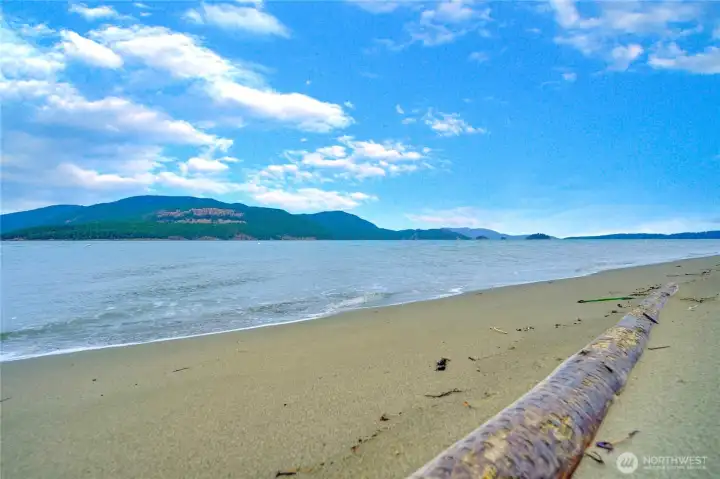 The owned & shared beach for Potlatch residents.  Sandy sandy sandy.  The islands look much larger in real life.
