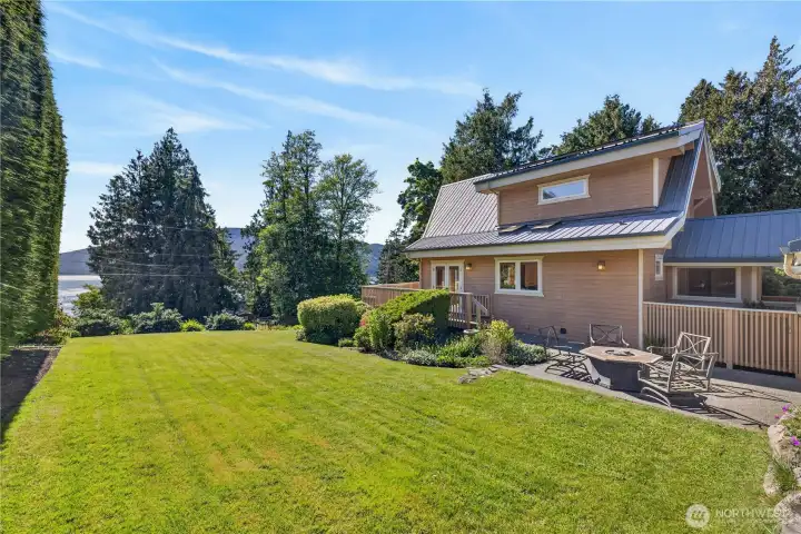 Looking over to house from garage stairs.