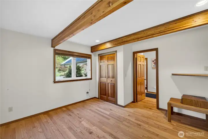 Spacious main floor bedroom off entry.  Bath across hallway.