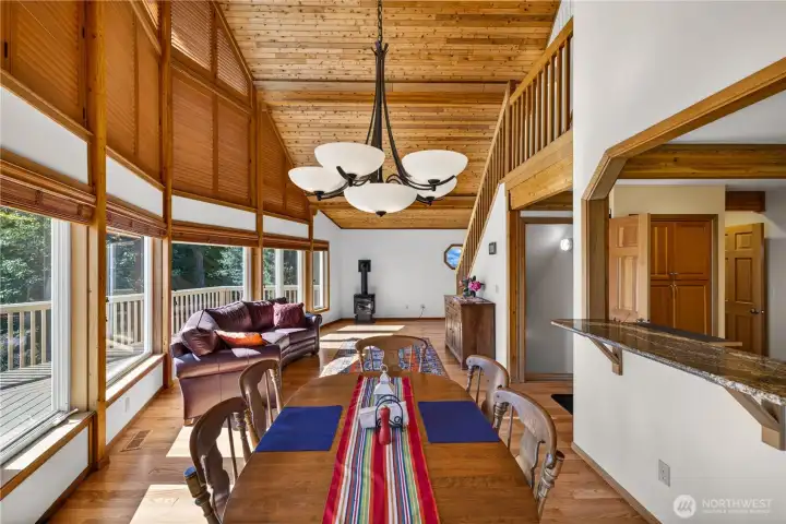 Great room with soaring ceilings and lots of windows.