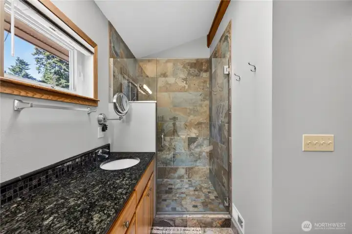 Anaother glassed-in shower.