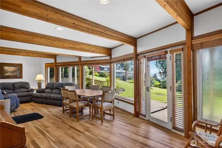Huge family room with French doors to outside patio and stairs to beaches.