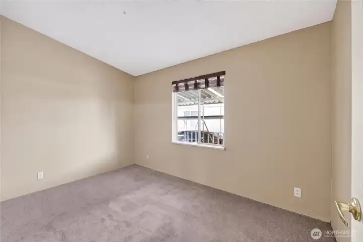 Bedroom #1 with fresh, new carpet.