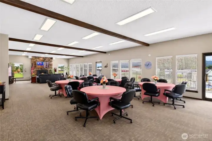 Community clubhouse features an upper level with dining area, kitchen, fireplace, restrooms and the Mountain Villa Estates management office.