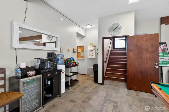 Lower level game room, lending library, restrooms, maintenance facilities.  Scheduled games, crafting and social events happen here and on the upper level.