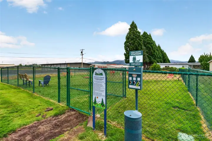 Fenced dog park on the grounds for games of fetch.