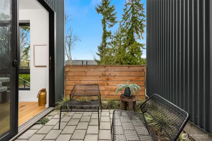 The front patio is nestled off the dining and living areas, making it the perfect spot for a grill, al fresco dining, or to relax after a long day.