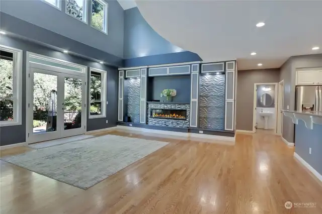 Gorgeous great room off the kitchen opens up to the private back yard oasis