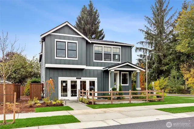 Model Home, same plan different elevation, windows will be black as shown.
