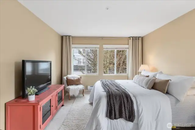 Light, bright and sunny primary bedroom.