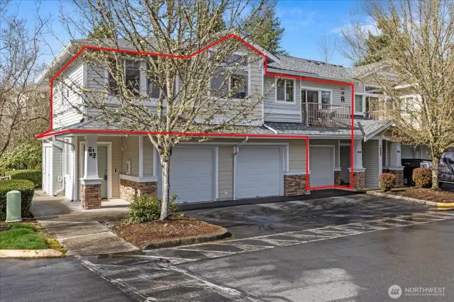 This end unit also features a lovely balcony.