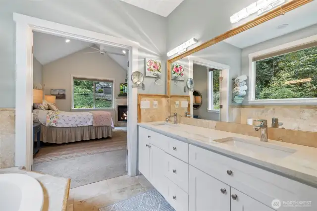 A full five-piece main bath is tastefully done and offers a spa-like feel.