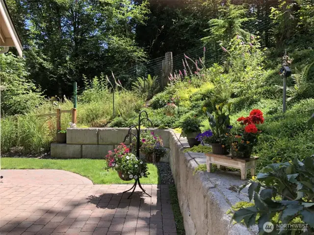 Add as much color and blooms as you like to the natural northwest setting.