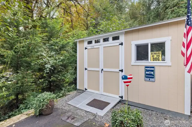 New storage shed conveys, saving the garage for your cars.
