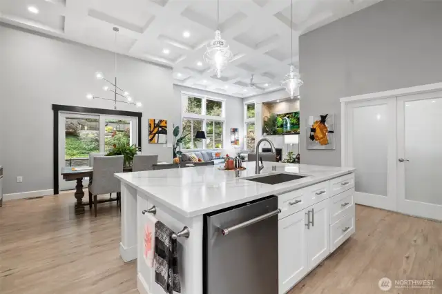 The kitchen is in the hub of the house, and the office is right next to it. The dining and living rooms are open to the kitchen and office.