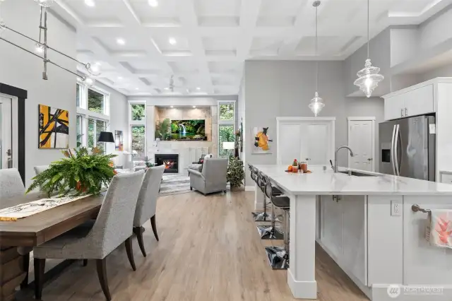 An open dining room for everyday meals, or holiday gatherings.  The large island offers additional seating.