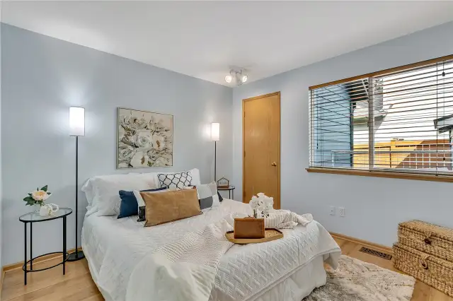 The cozy main-floor bedroom offers both comfort and convenience, with easy access to the adjacent ¾ bath, making it perfect for guests or flexible living arrangements.