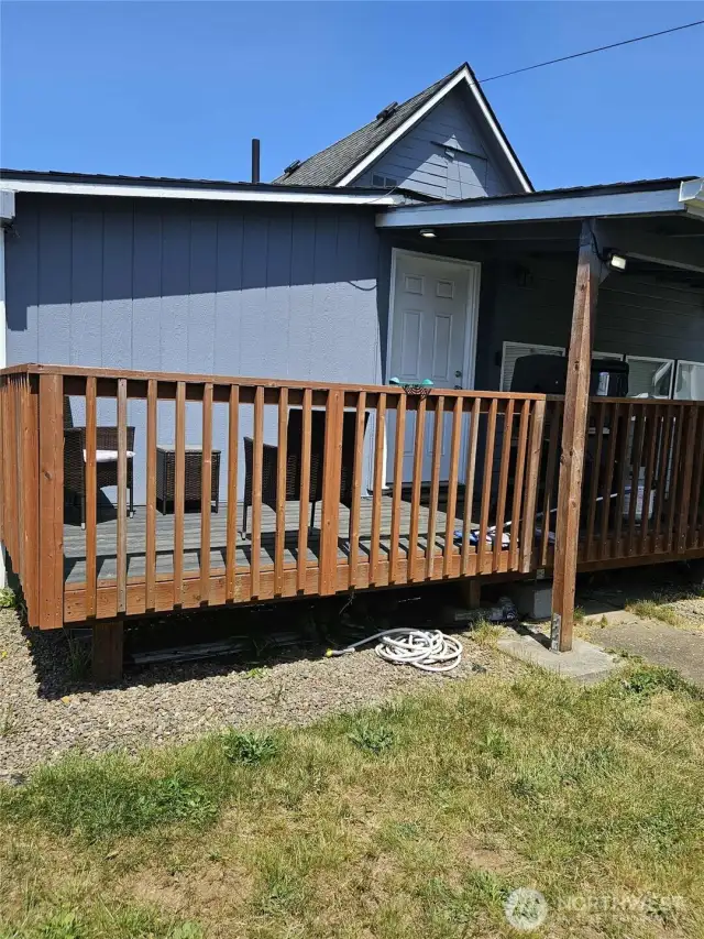 back deck, great for BBQ season! partially covered