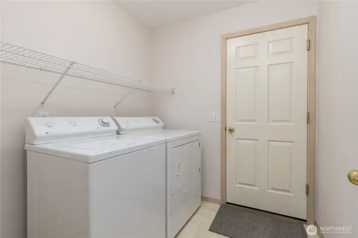 Utility room connects to the attached 2-car garage