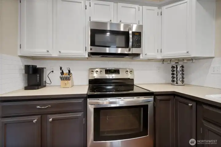 Full Subway tile backsplash and hardware on cabinets and drawers.