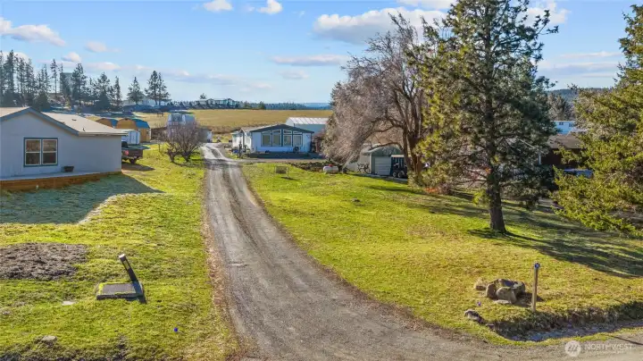 Long drive up to your home, shop and barn